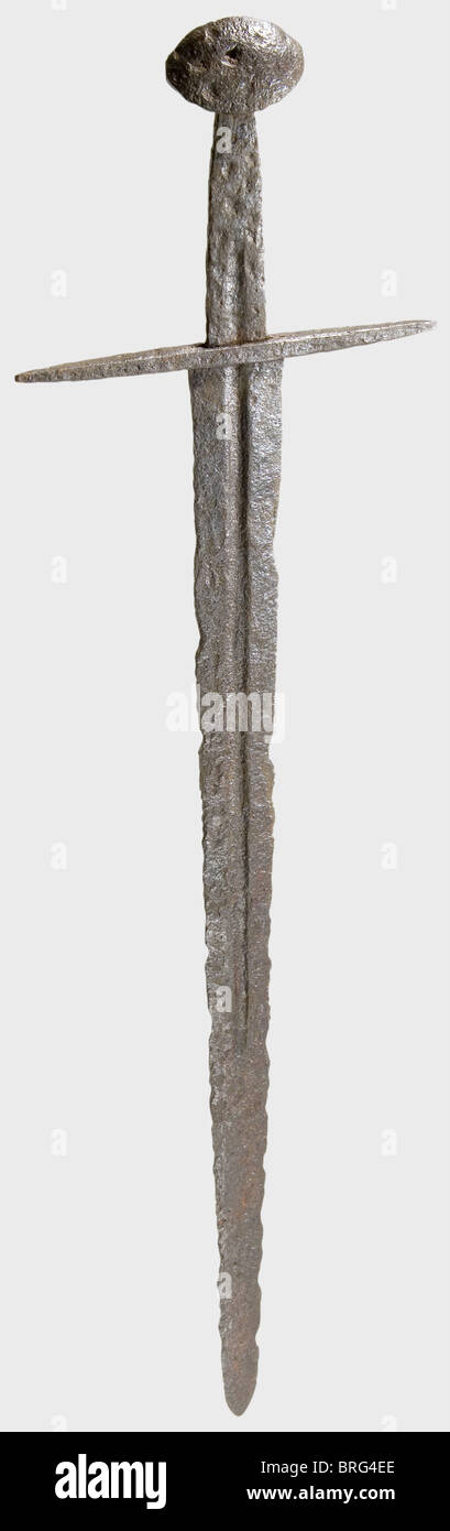 A German knightly sword,circa 1200. Double-edged blade with fullers on ...