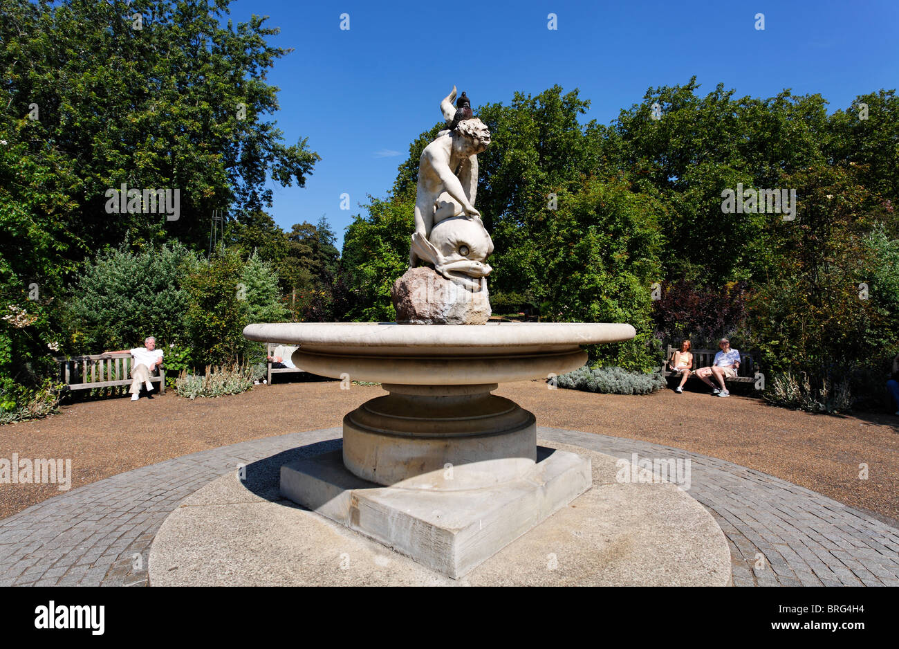 Boy With Dolphin statue by Alexander Munro, Hyde Park, London, UK Stock Photo