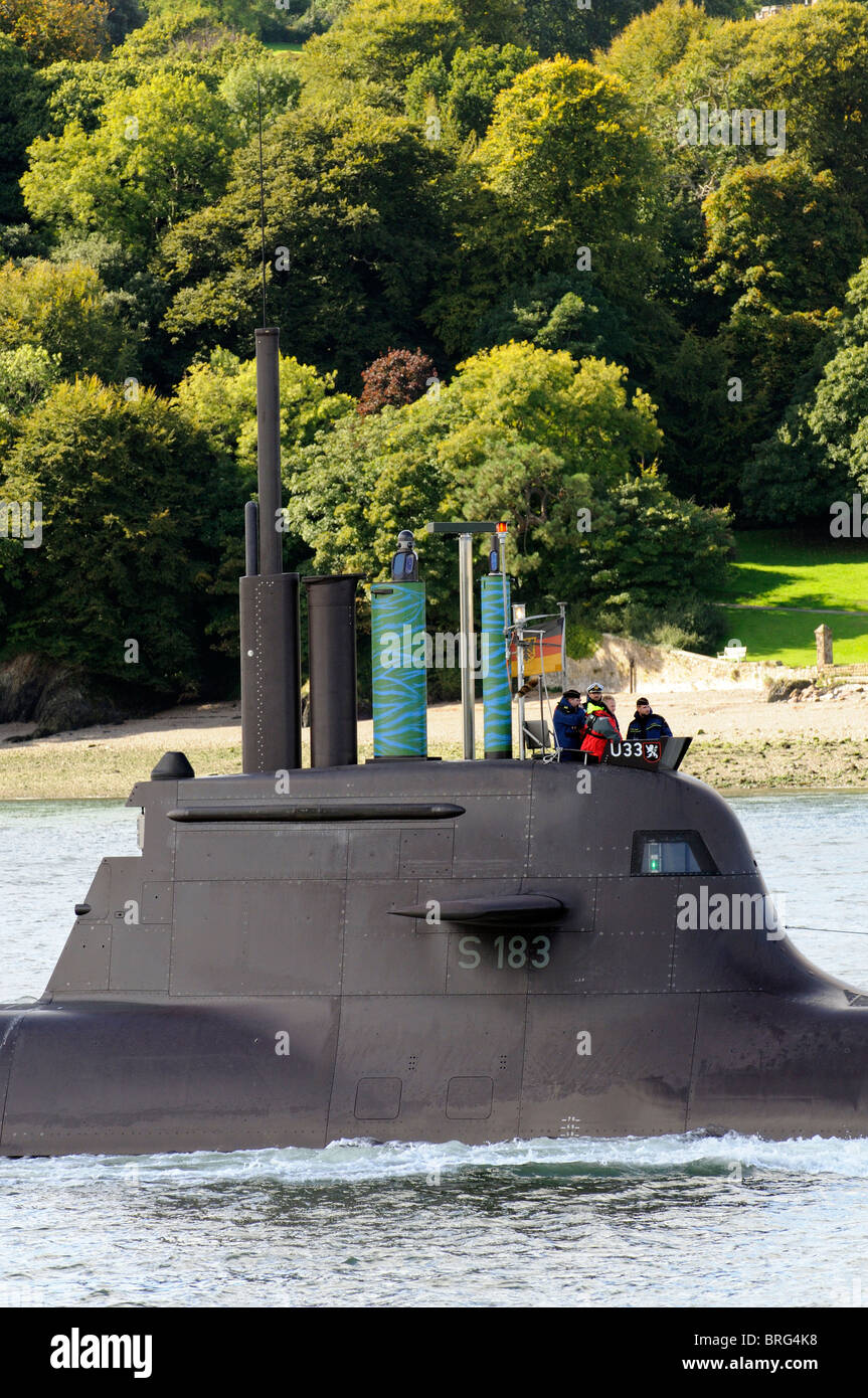 German Navy U33 submarine with officers on the conning tower of the vessel seen underway on the River Tamar Devon England UK Stock Photo