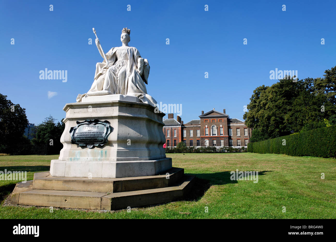 Statue of Queen Victoria by her daughter Princess Louise, outside Kensington Palace, London, UK