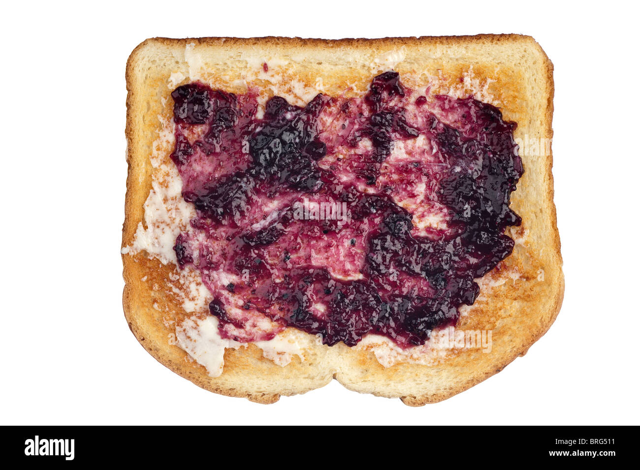 A slice of toasted white bread with butter and grape jelly spread. Stock Photo