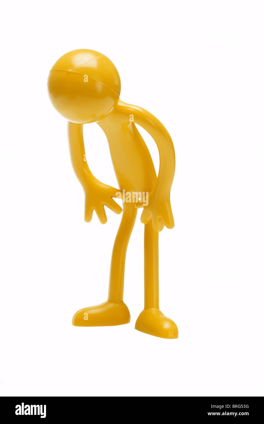 Toy rubber figurine bowing on white background Stock Photo Alamy