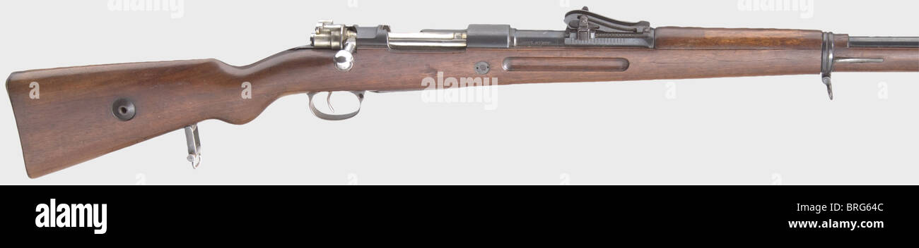 A Wehrmanngewehr JGA,for military training,calibre 8.15 x 46R,no.12133.Matching numbers except for carrier which is marked '66'.Bright bore.5-shot.Lange sight,scaled 4 - 20.On barrel root marked 'JGA' inside a circle which is the logo of the J.G.Anschütz Company,Zella-Mehlis/Thuringia.On the right labelled 'BÖHLER STAHL'.Complete original finish,fittings slightly spotted and matt.Lock in the white.Dark brown walnut stock with light wear marks.Complete with cleaning rod.Top item in almost new condition.Length 125 cm.Erwerbsscheinpflichtig.h,Additional-Rights-Clearences-Not Available Stock Photo