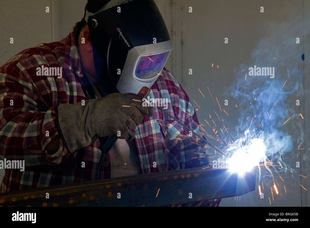 Shielded metal arc welding. Stock Photo