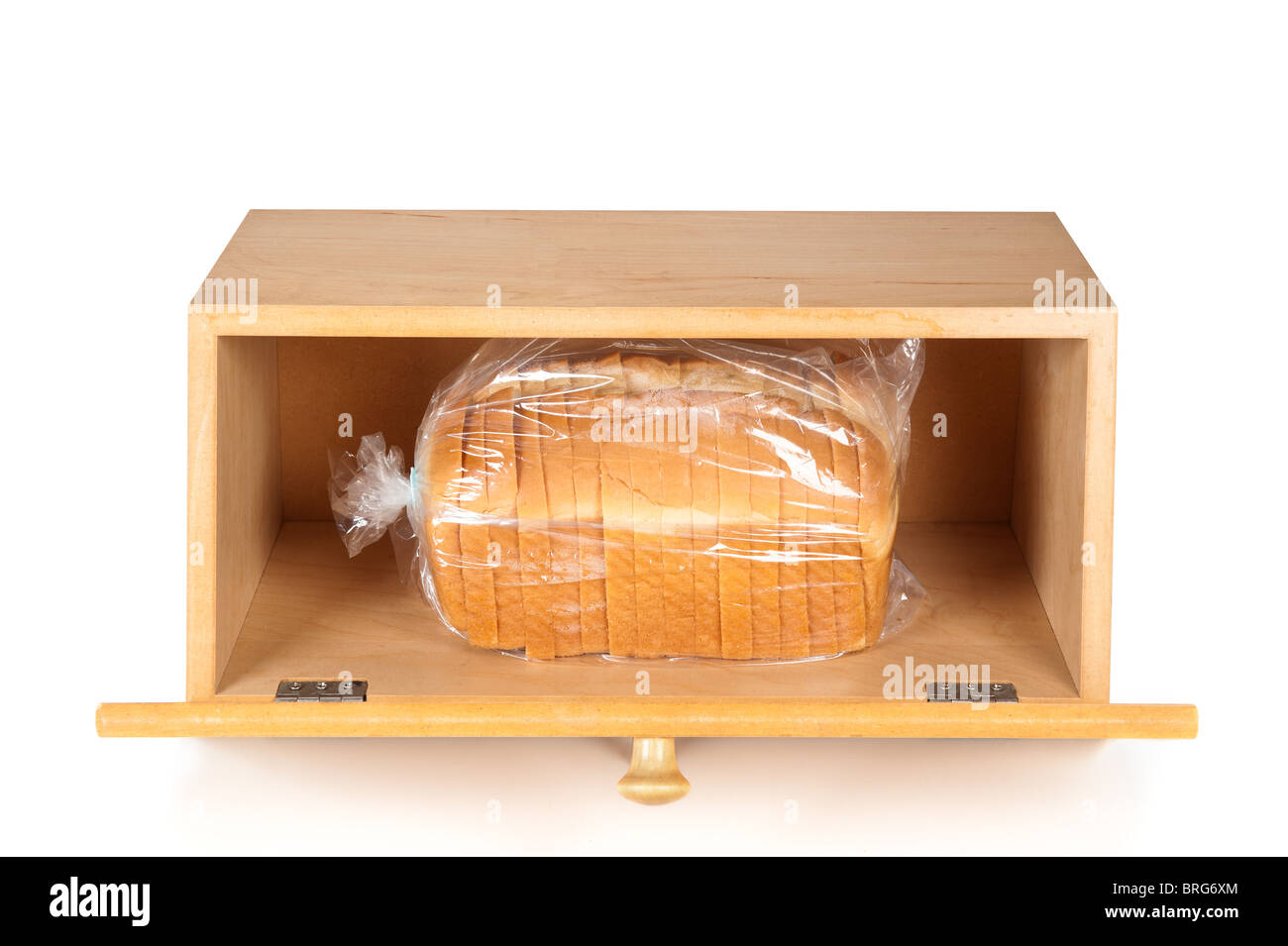 A breadbox with a fresh loaf of bread on a white background. Stock Photo