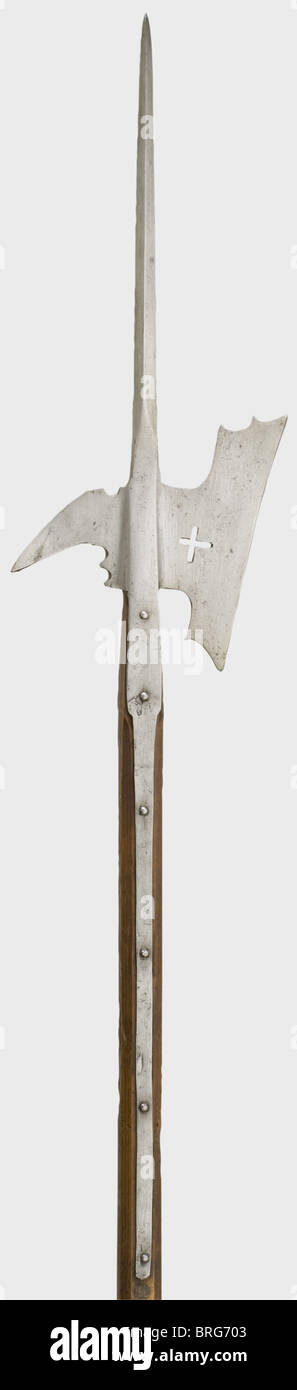 A Swiss halberd,2nd half of the 16th century Quadrangular spike with a massive base.Long rectangular blade with an angled edge,broad neck,upper and lower edges with crescent-shaped cut-outs,and perforated with a Swiss cross.Flat beak with a master's mark in the shape of three balls in a shield stamped on one side.Two languets,one partially replaced.The octagonal shaft is a replacemet with repairs.Length 241 cm.This same type of halberd may be found among the contents of the old Bern armoury.Cf.Rudolf Wegeli,III.Stangenwaffen,Inventar des Bernisc,Additional-Rights-Clearences-Not Available Stock Photo