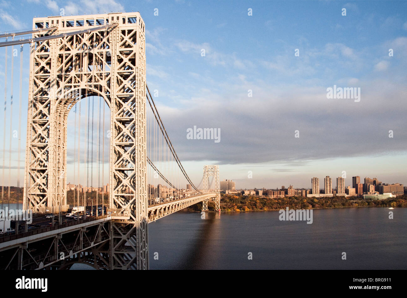 A view of the George Washington Bridge from the New Jersey side of the Hudson River. Manhattan can be seen in the distance. Stock Photo