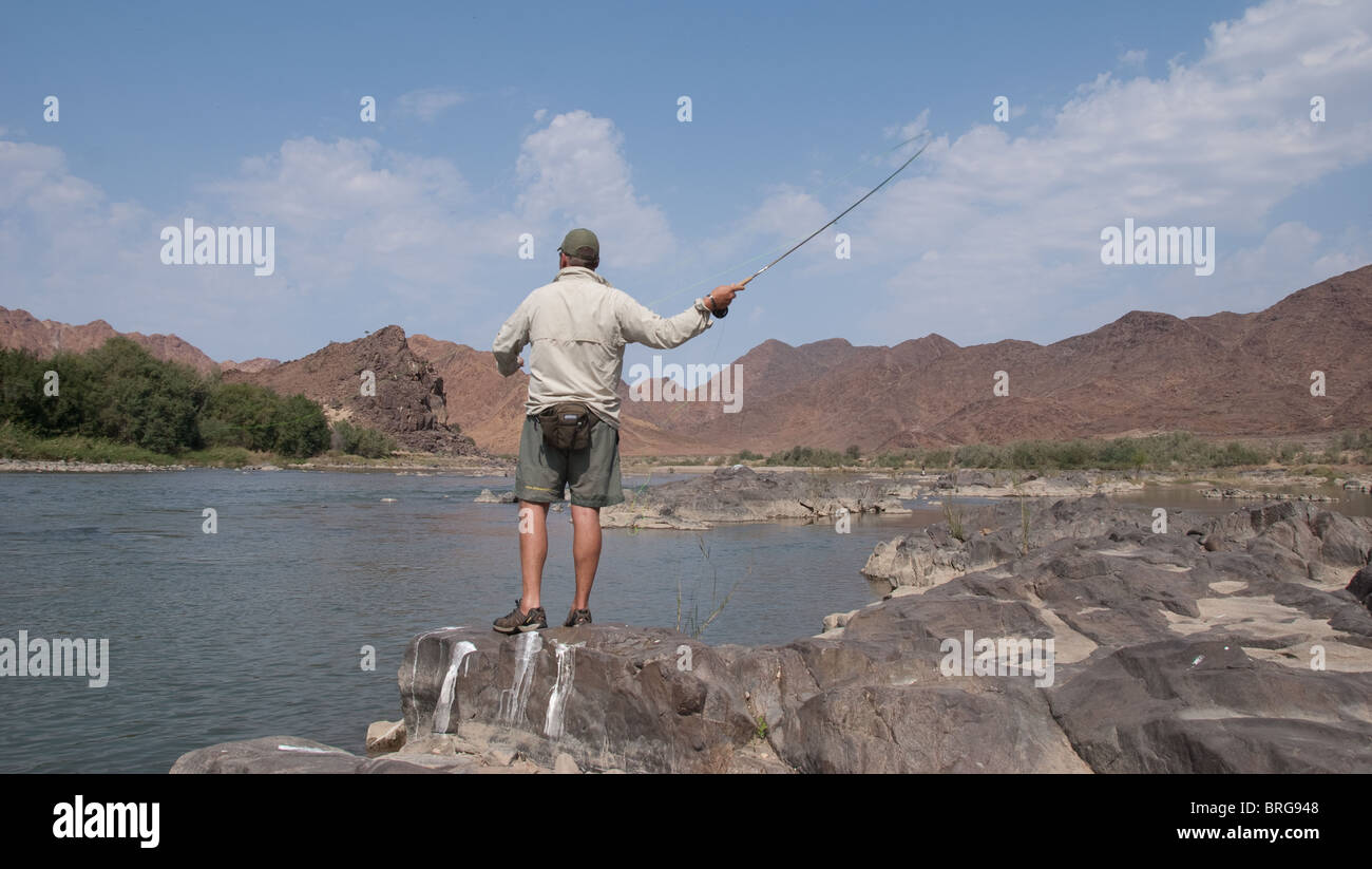 Flyfishing on the Orange river, Southern Africa Stock Photo