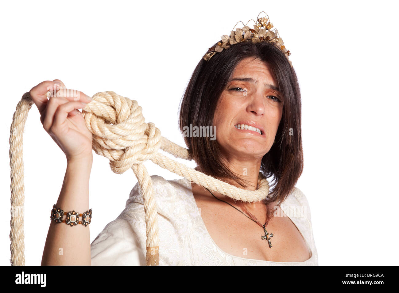 Sad beautiful bride with a hanging rope (isolated on white) Stock Photo