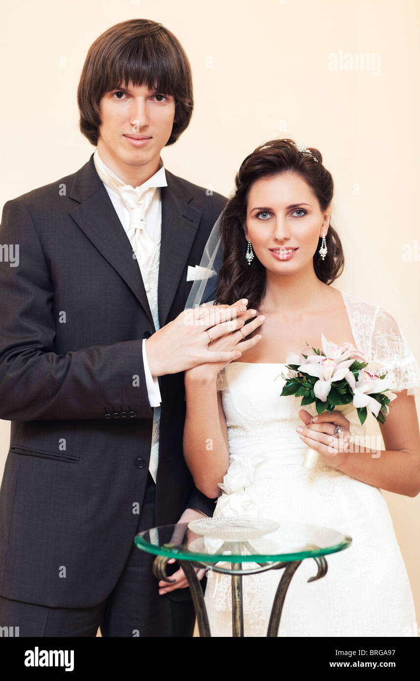 Young wedding couple indoors portrait Stock Photo - Alamy
