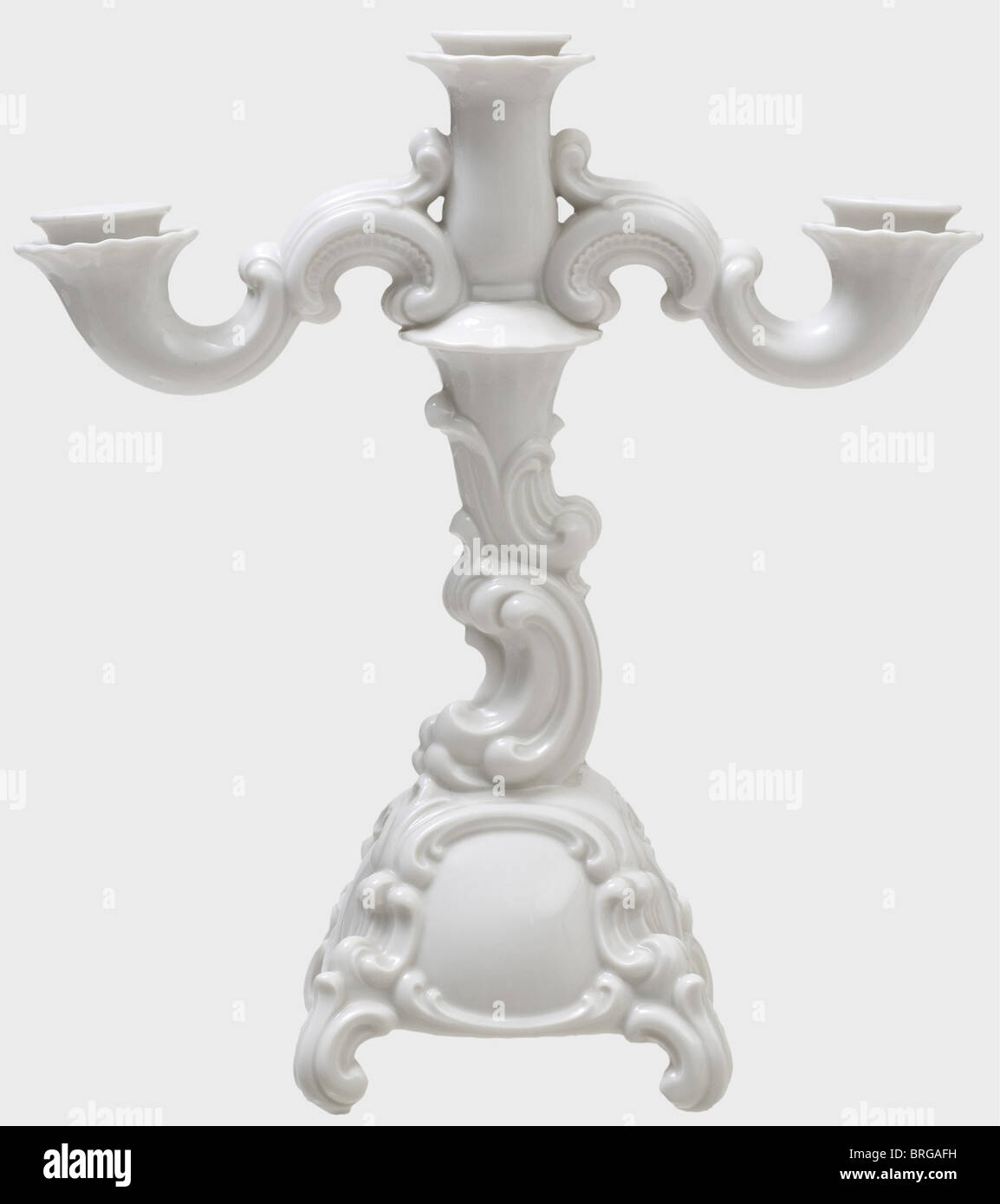 A pair of three branch Baroque candelabras, Allach Porcelain Factory Design by Franz Nagy. Model Number 21. White, glazed porcelain. On the bottom in underglaze green the manufacturer's mark in an octagon. Height 32 and 33 cm. Absolutely undamaged., historic, historical, 1930s, 1930s, 20th century, object, objects, stills, clipping, clippings, cut out, cut-out, cut-outs, Additional-Rights-Clearences-Not Available Stock Photo
