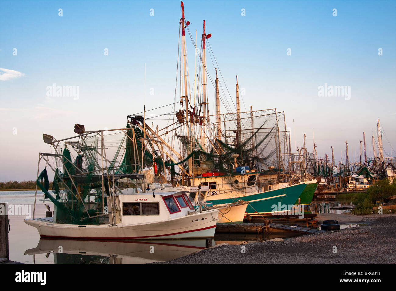 Shrimp boats lined up at dock in Cameron, Louisiana Stock Photo - Alamy