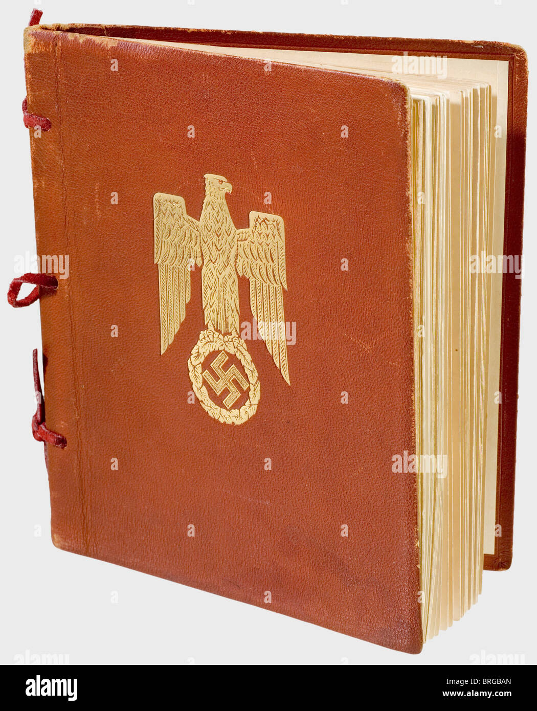 Gauleiter Adolf Wagner,a presentation picture book for delegation members on the occasion of Benito Mussolini's visit 'München,die Hauptstadt der Bewegung grüßt Benito Mussolini'(Munich,the Captial of the Movement Welcomes Benito Mussolini)with a card pasted on the flyleaf,'The Gauleiter and State's Minister Adolf Wagner is honoured to present this work produced in the movement's capital on the occasion of the visit by the Head of the Italian government,Benito Mussolini.Munich,September 1937'(transl.).Luxurious presentation volume in German and Itali,Additional-Rights-Clearences-Not Available Stock Photo