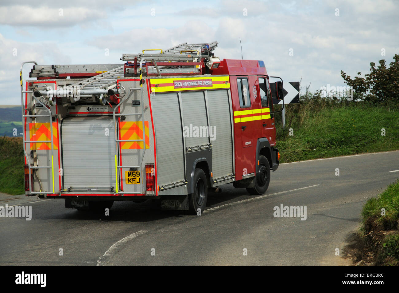 Fire engine on a country lane close to Modbury south Devon England Stock Photo