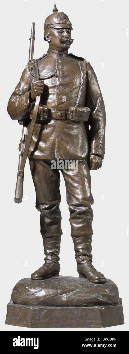 A bronze figure by Paul Juckoff 1898,an infantry soldier in the Royal Saxon Infantry Regiment,Prince Johann Georg,No. 107 Bronze with brown patina. Detailed representation of a soldier equipped for field service. The plinth is signed and dated on the side,'Juckoff Fec. 98'. Height 58 cm. Impressive sculpture. Paul Juckoff(1874 -?),sculptor in Skopau,studied 1895 - 1900 at the Leipzig Academy,created numerous memorial monuments(for Wedell in Kriegsdorf,Bismarck in Halle,Scharnhorst in Groß-Görschen)and busts(Prince Eitel Friedrich,Empress Auguste V,Additional-Rights-Clearences-Not Available Stock Photo