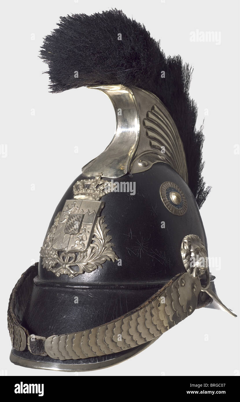 A model 1850 helmet for enlisted men,of the Bavarian civil militia Leather skull,nickel-silver comb,silver-plated,coat of arms emblem,metal chinscales on lion's heads. Original horsehair crest,cockades. Sheepskin lining somewhat restored. Beautiful helmet in good overall condition.,historic,historical,19th century,Bavaria,Bavarian,German,Germany,Southern Germany,the South of Germany,object,objects,stills,militaria,clipping,cut out,cut-out,cut-outs,helmet,helmets,headpiece,headpieces,utensil,piece of equipment,utensils,protection,,Additional-Rights-Clearences-Not Available Stock Photo
