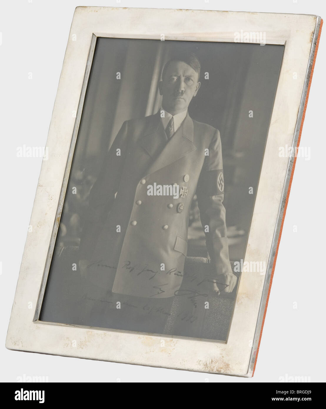 Professor Rudolf Jung (1882 - 1945), an Adolf Hitler dedication photograph Large format photograph in party uniform with ink dedication on the lower edge 'Herrn Prof. Ing. Rudolf Jung - Adolf Hitler - Berlin, den 20/Mai 1939' (To Engineering Professor Rudolf Jung - Adolf Hitler - Berlin, 20th May 1939) in a silver frame (925 WTB) with light red leather reverse and frame support. 27 x 21 cm. The trans people, 1930s, 20th century, NS, National Socialism, Nazism, Third Reich, German Reich, Germany, German, National Socialist, Nazi, Nazi period, fascism, object, ob, Stock Photo