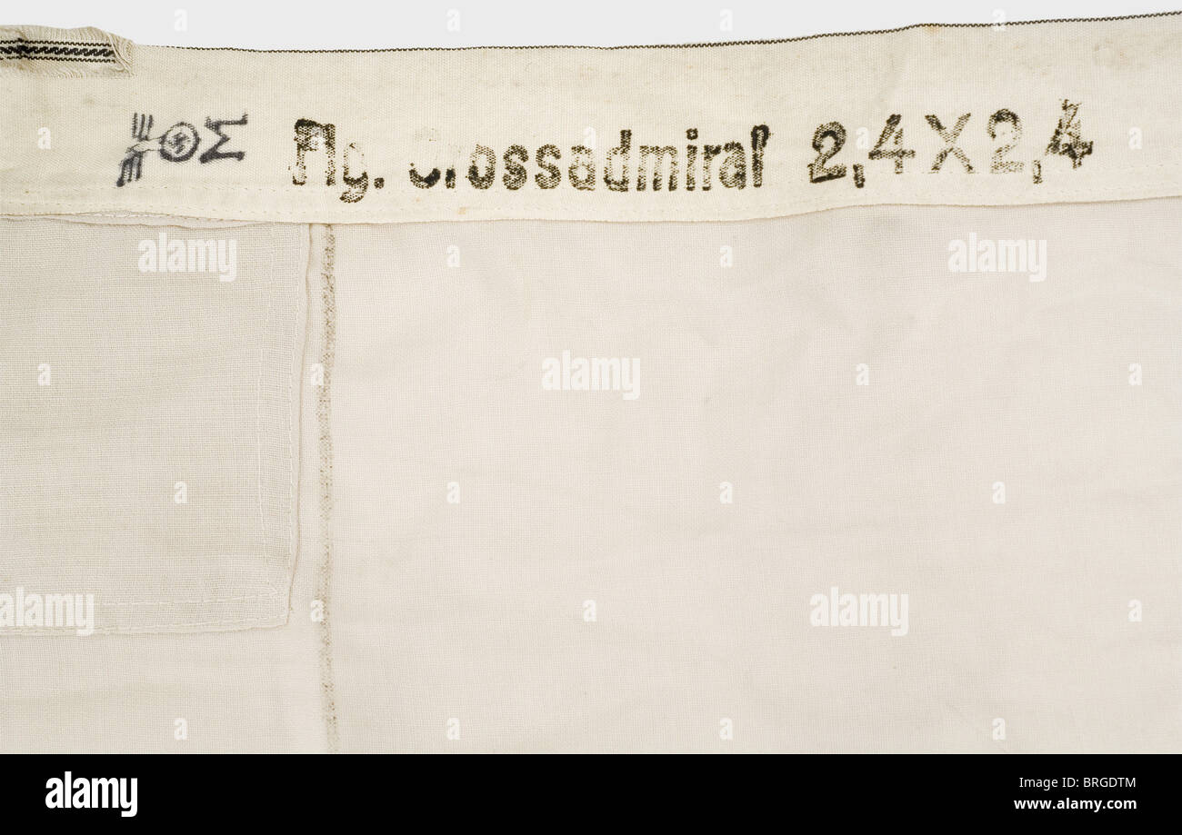 Grand Admiral Karl Dönitz, a flag of the Grand Admiral White cotton linen, both sides imprinted in colour with an Iron Cross, on which are crossed Grand Admiral's batons with applied eagle. Stamped 'Flg. Grossadmiral 2,4 x 2,4' and naval acceptance stamp. Attachment loops abscised., historic, historical, 1930s, 20th century, navy, naval forces, military, militaria, branch of service, branches of service, armed forces, armed service, object, objects, stills, clipping, clippings, cut out, cut-out, cut-outs, document, documents, Additional-Rights-Clearences-Not Available Stock Photo