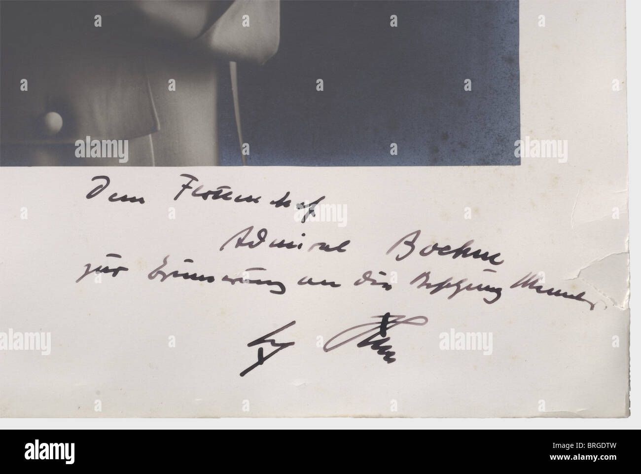 Admiral Hermann Boehm (1884 - 1972), an official presentation photograph of Adolf Hitler 1939 A large format Hoffmann photo, showing Hitler in profile in party uniform. There is an autograph dedication by Hitler on the passepartout, "Dem Flottenchef Admiral Boehm zur Erinnerung an die Besetzung Memels - Adolf Hitler" (To Fleet Commander Admiral Boehm in Commemoration of the Occupation of Memels - Adolf Hitler) along with the date "23/März 1939". Hermann Boehm, was among other things, a torpedo boat commander in the First World War. Discharged as a lieutenant, h, Stock Photo
