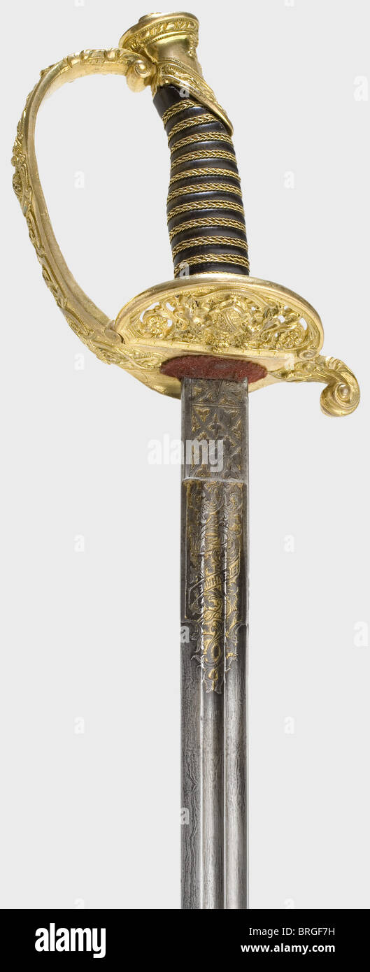A model 1867 officer's sword of the Saxon infantry,in special version Straight single-edged Damascus blade with double fullers,partly etched and gilt(somewhat worn)with 'Eisenhauer' on the obverse,and 'Damaststahl' on the reverse side. Gilded brass hilt with fine decoration in relief. The folding guard plate and knucklebow bears the Saxon coat of arms. Horn grip with gilded wire winding. Lacquered iron scabbard with one movable suspension ring and riding loop. Length 103 cm.,historic,historical,19th century,Saxony,Saxonia,Saxonian,German,Germany,m,Additional-Rights-Clearences-Not Available Stock Photo