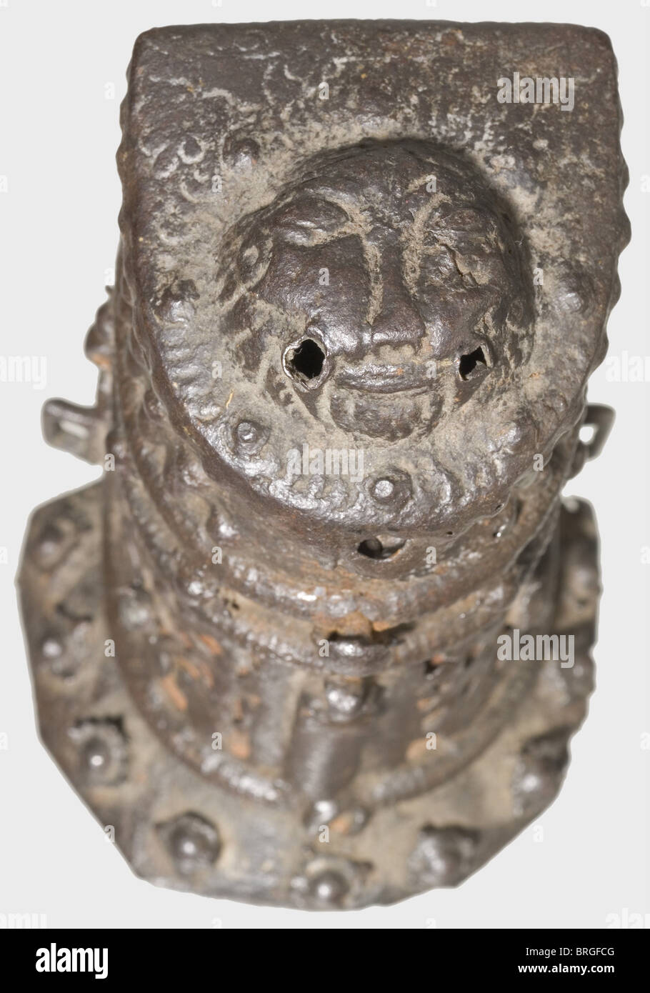 A German or French cartridge box,2nd half of the 16th century. Forged iron body with richly embossed decoration. The obverse side is perforated in places and backed with red cloth. Surrounded with decorative rivets. Three suspension rings. Spring-loaded lid with a latch on the front. Embossed lion head in low relief on top. There is an insert for five cartridges inside. Height 11.5 cm. historic,historical,16th century,powder flask,accessory,accessories,military,militaria,object,objects,stills,utilities,utility,clipping,clippings,cut out,cut-out,Additional-Rights-Clearences-Not Available Stock Photo