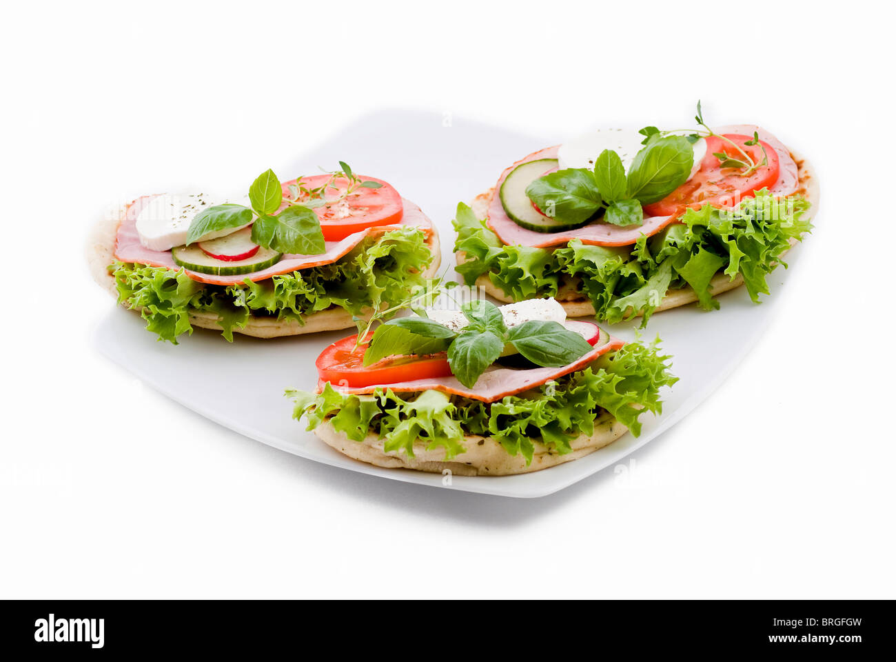 Fresh vegetable sandwiches on pita bread - isolated Stock Photo