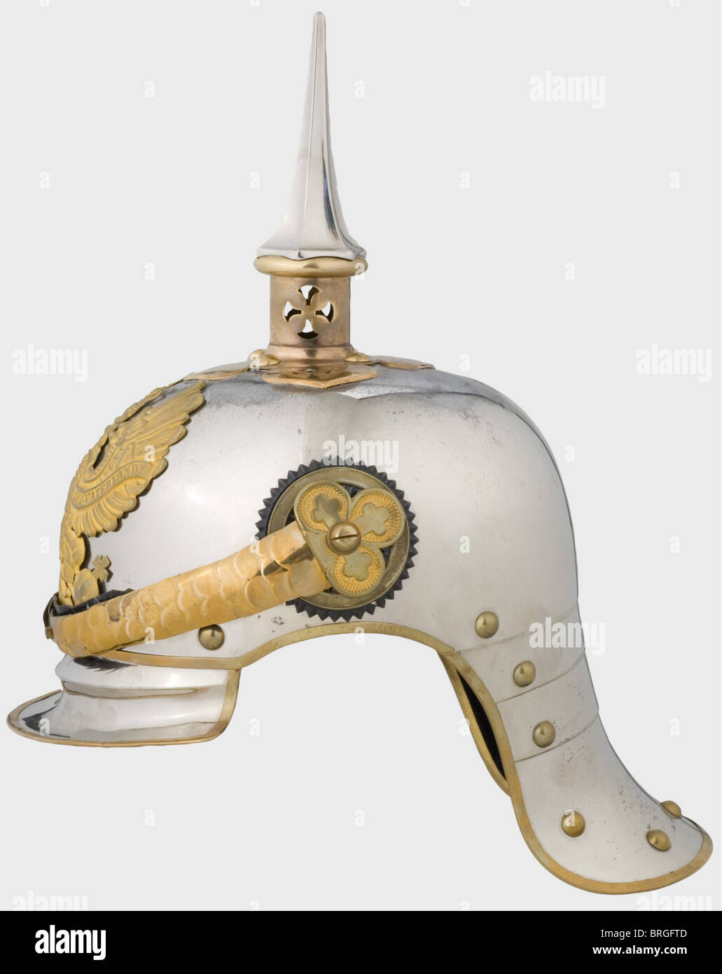A helmet for officers,of the 3rd,4th,5th,7th and 8th Prussian Cuirassier Line Regiments Nickel-plated,steel skull with gilded tombac mountings,long neck protector with lames indicated,and fluted brim. Eagle for regiments of the line with frosted gilding. Beige ribbed silk lining with the owner's monogram 'B' under a count's coronet. Rear brim lined with black velvet. With the carrying case. The nickel-plating on the skull is somewhat lusterless on top,otherwise an imposing helmet.,historic,historical,19th century,Prussian,Prussia,German,Germany,,Additional-Rights-Clearences-Not Available Stock Photo