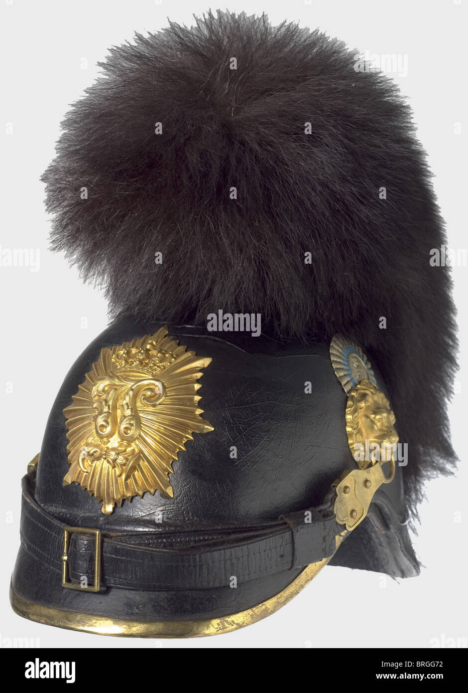 A model 1868 helmet for officers,of the Reserve and Landwehr of the Royal Bavarian Infantry Especially light skull of lacquered felt. Gilded mountings with the special emblem for reserve and Landwehr officers. Silver-plated officers' cockade. Chin straps on lion heads. Leather lining. Bearskin crest. This model was only worn between 1881 and 1886 This helmet is illustrated in Seibold/Schulz,Die Helme der kgl. Bayerischen Armee,p. 153.,historic,historical,19th century,Bavaria,Bavarian,German,Germany,Southern Germany,the South of Germany,object,obje,Additional-Rights-Clearences-Not Available Stock Photo