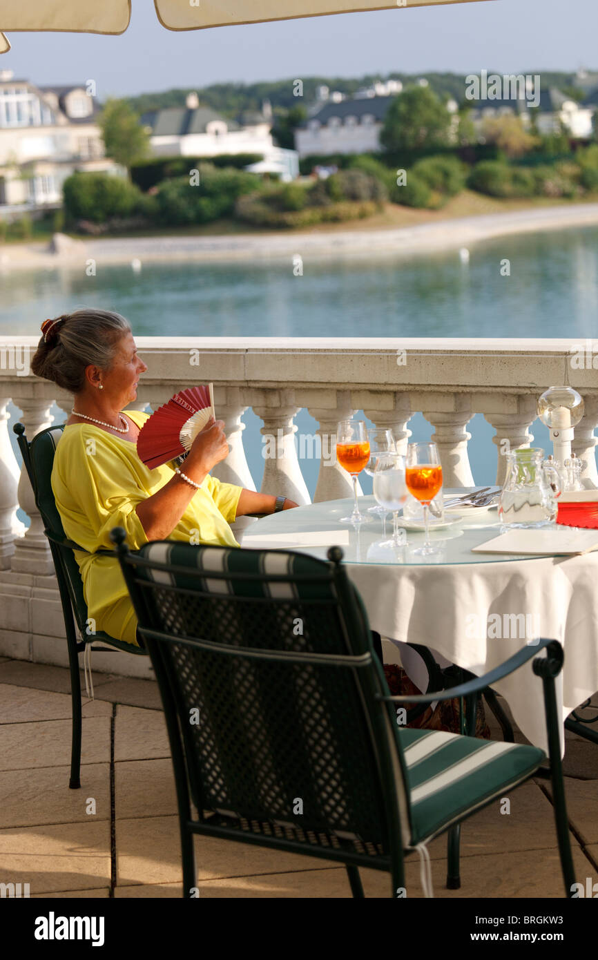 woman relaxing on terrace Stock Photo - Alamy