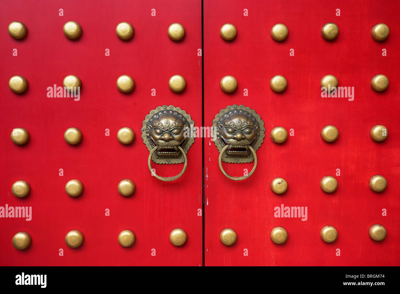 A pair of lion guards outside a Chinese restaurant in South London. Stock Photo