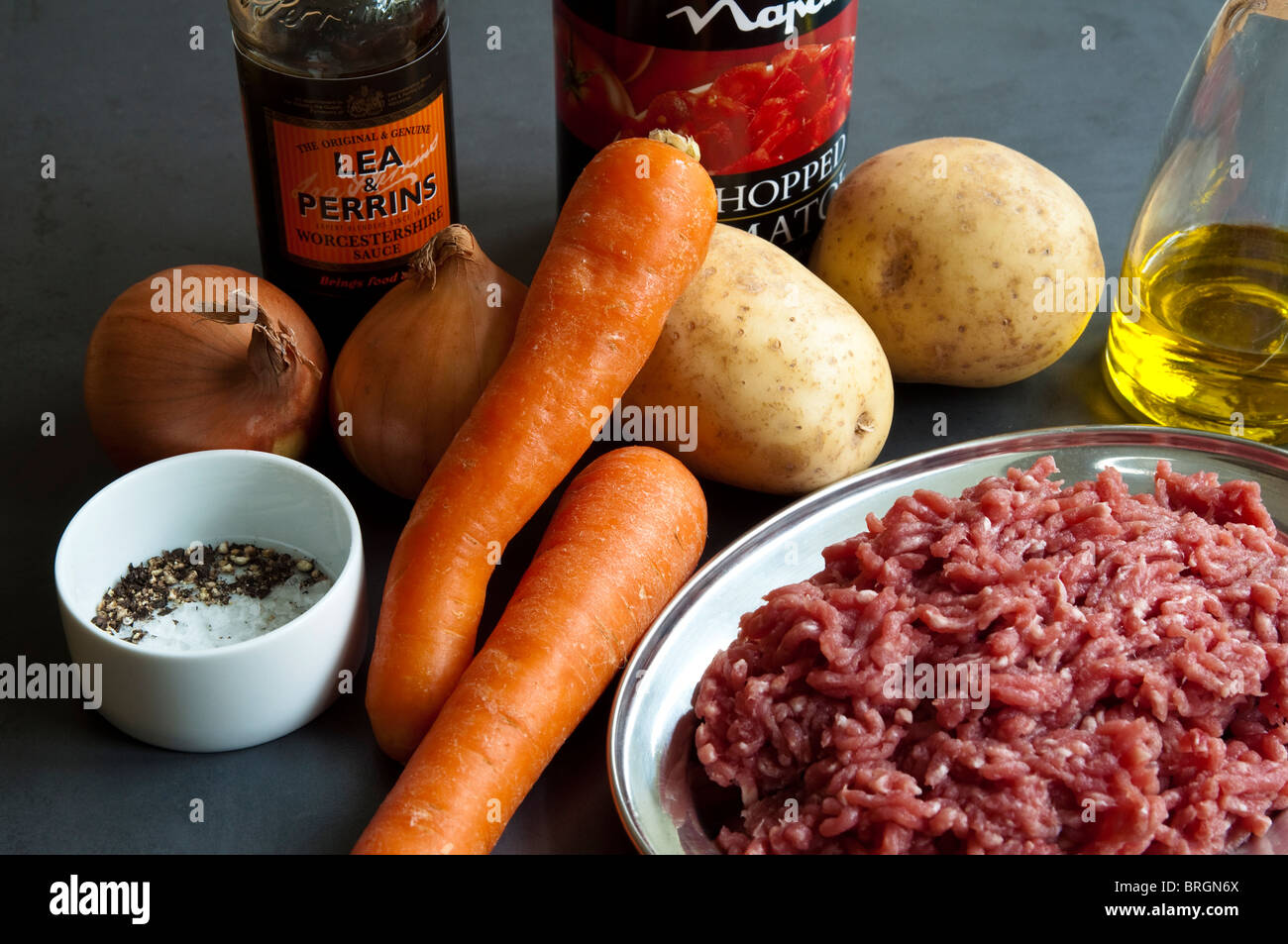 Main ingredients for Shepherds Pie raw mince lamb, tin of tomatoes
