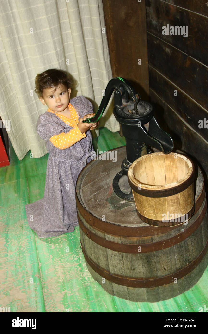 kid vintage water pump Stock Photo