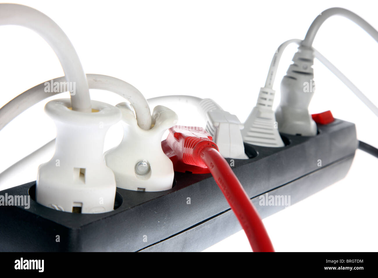 Home electrics, power supply, multi sockets, electric cables, plugs. Stock Photo