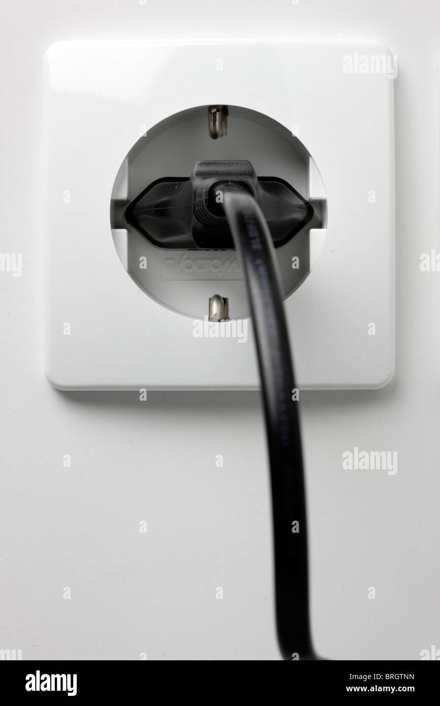 Electric plug and electrical wall socket Stock Photo Alamy