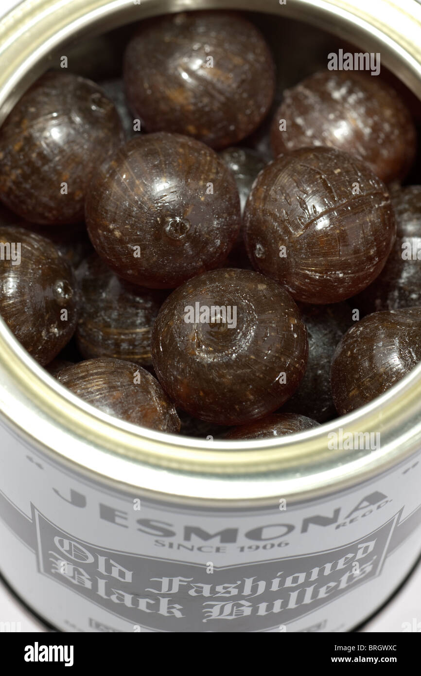 Opened tin of Maxons of Sheffield Jesmona old fashioned black bullet sweets Stock Photo