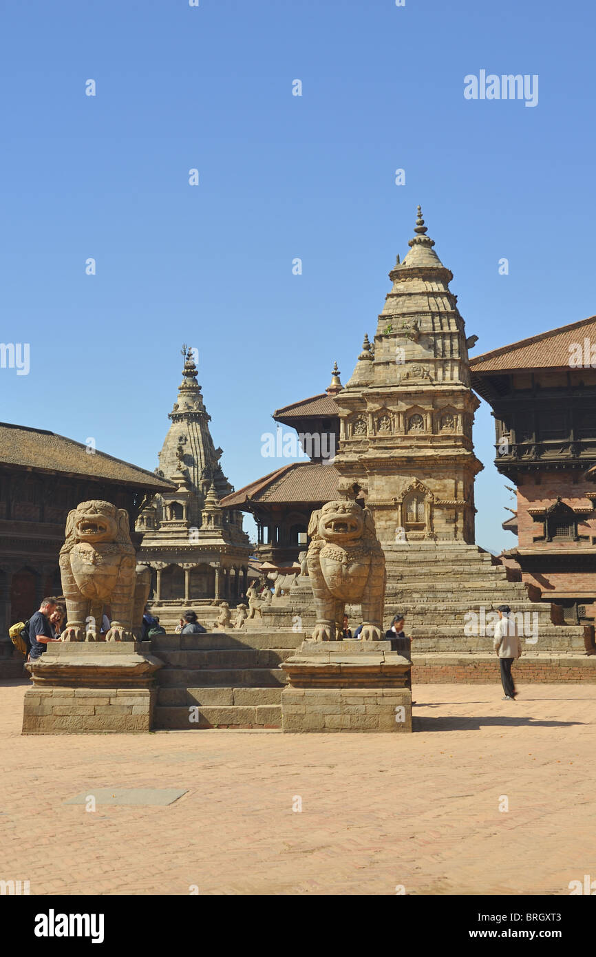 Stone lions, Indra Varna Madavihar, Bhaktapur, Kathmandu Stock Photo