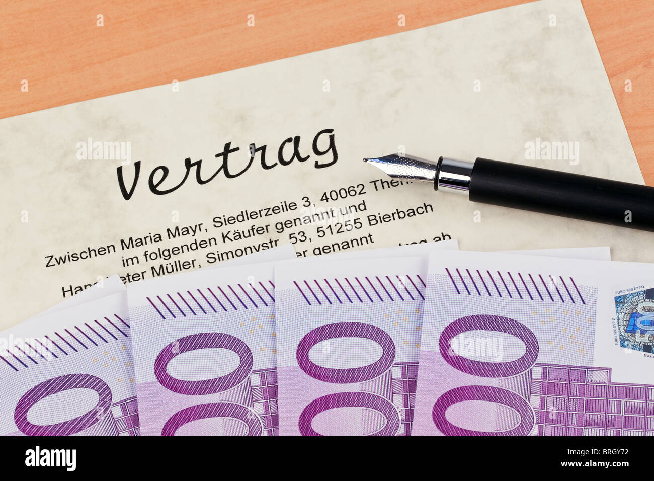 Many Euro notes and contract Stock Photo