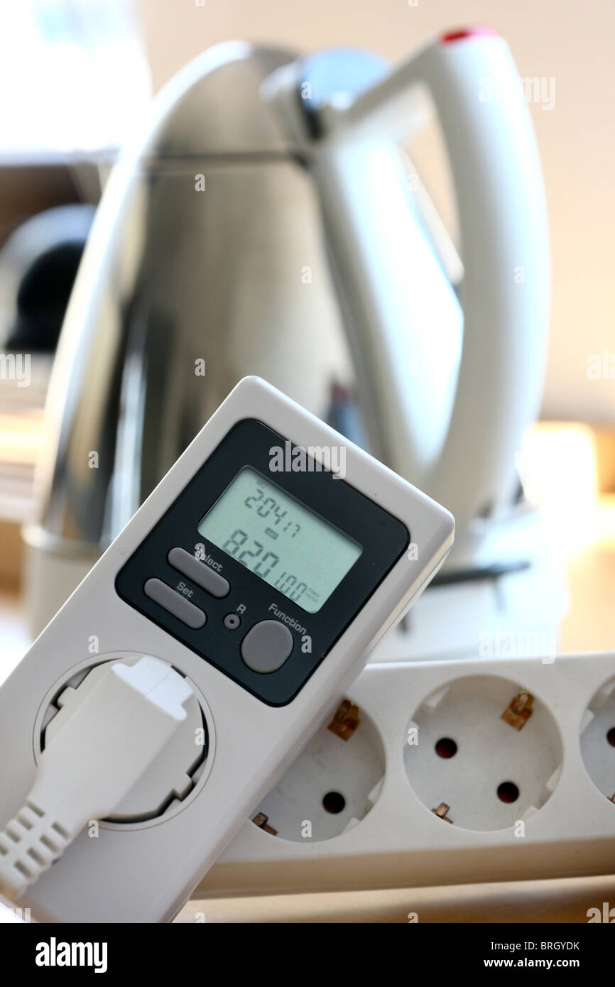 Power consumption measuring device for home usage. To record power consumption. Stock Photo