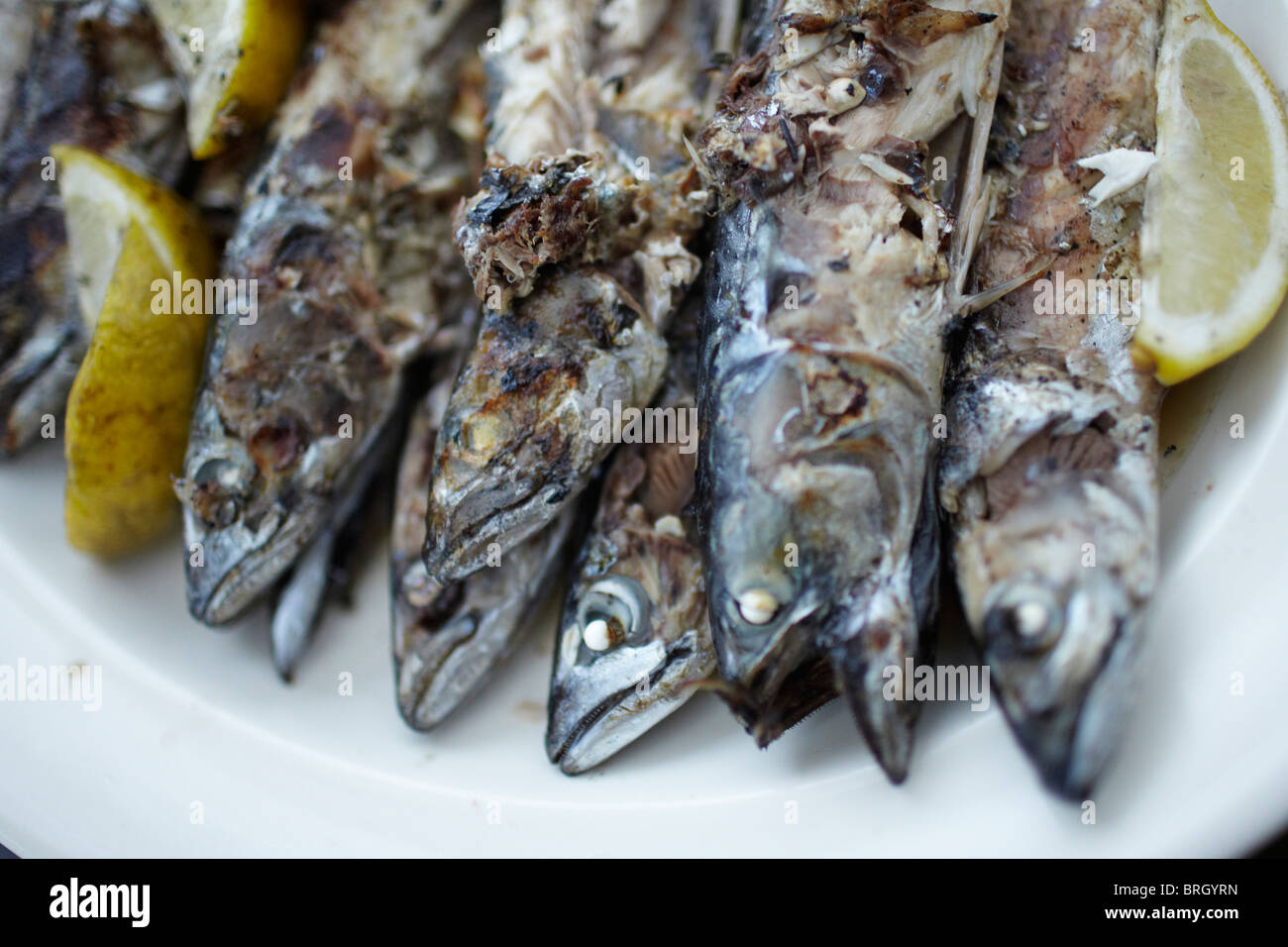 grilled mackerel with lemon and toasted almonds Stock Photo Alamy
