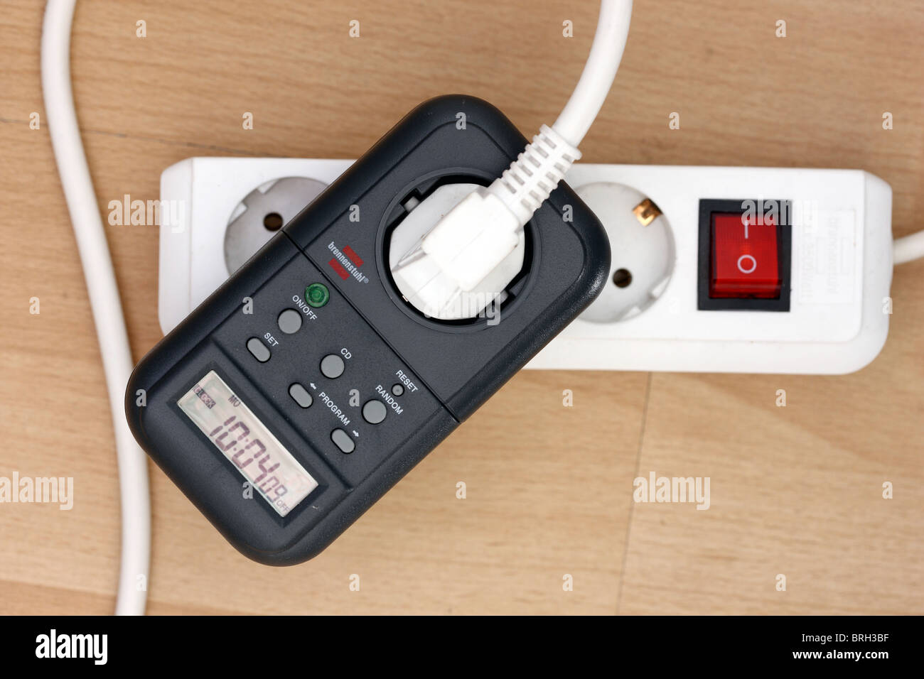 Home electrics, timer switch, for electric household appliances. Stock Photo