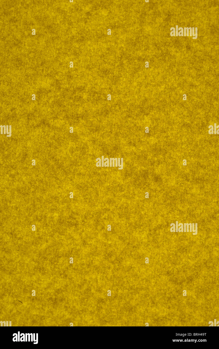 Yellow mottled background as seen on lightbox Stock Photo