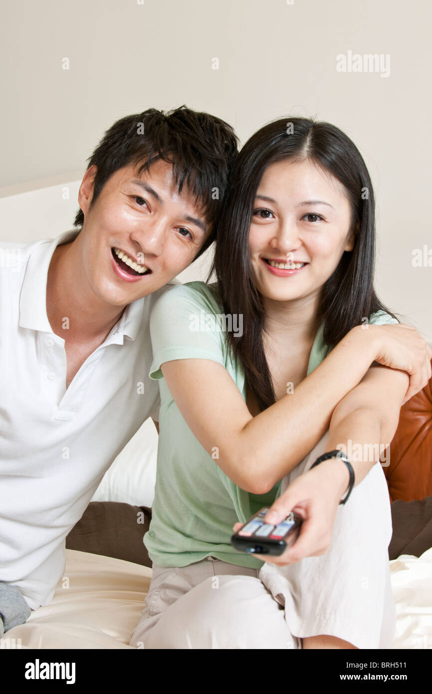 Portrait of young couple Stock Photo - Alamy