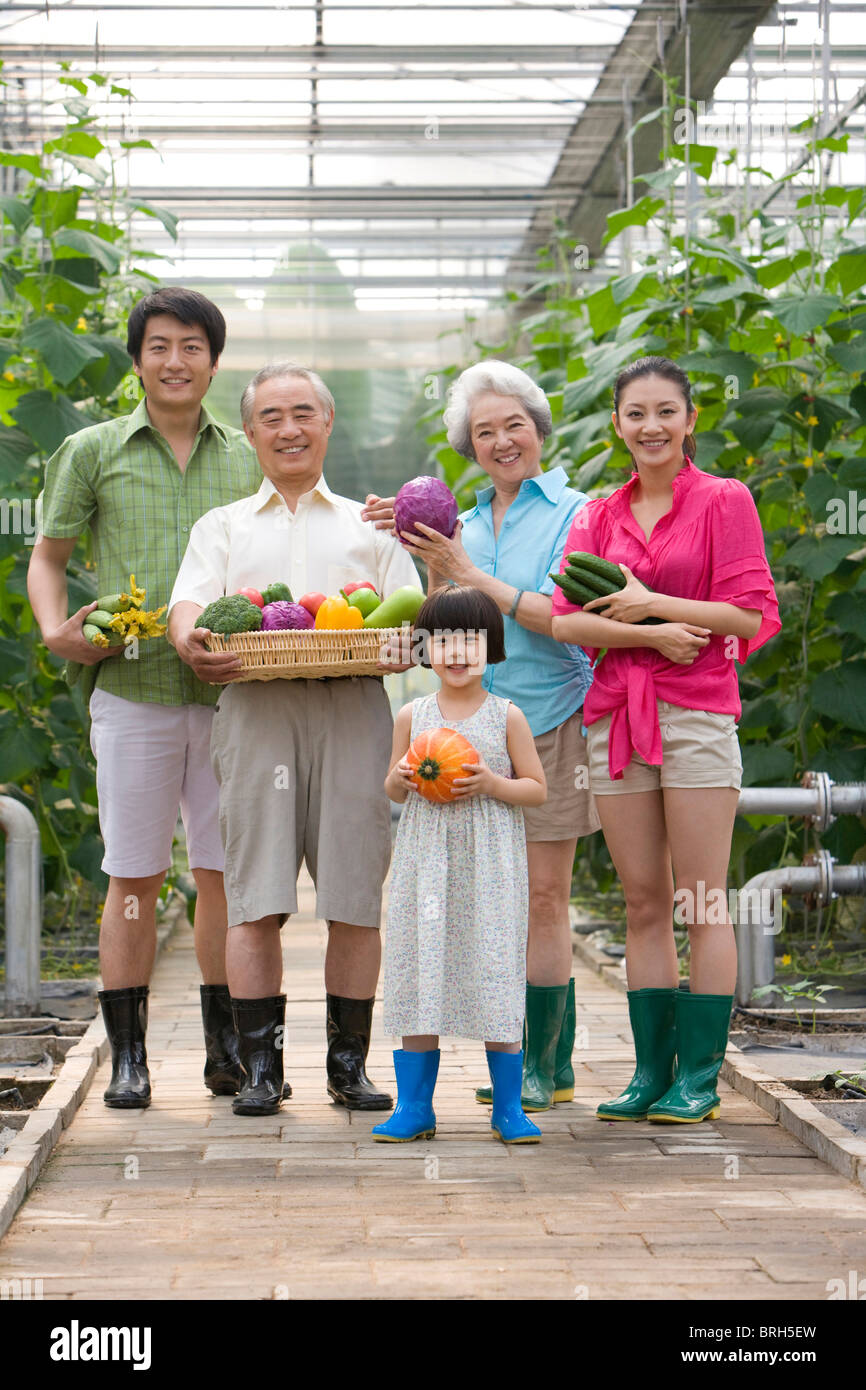 Family gardening in modern farm Stock Photo