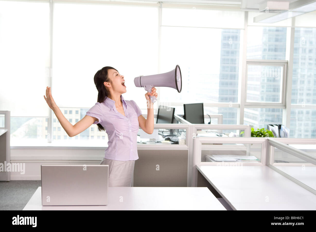 Getting loud in the office Stock Photo Alamy