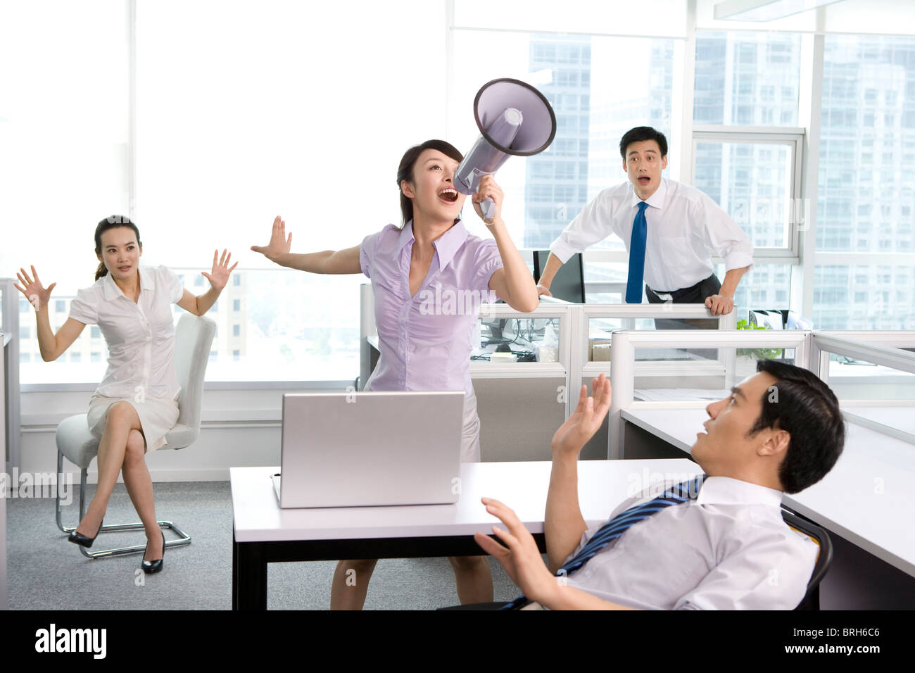 Getting loud in the office Stock Photo Alamy