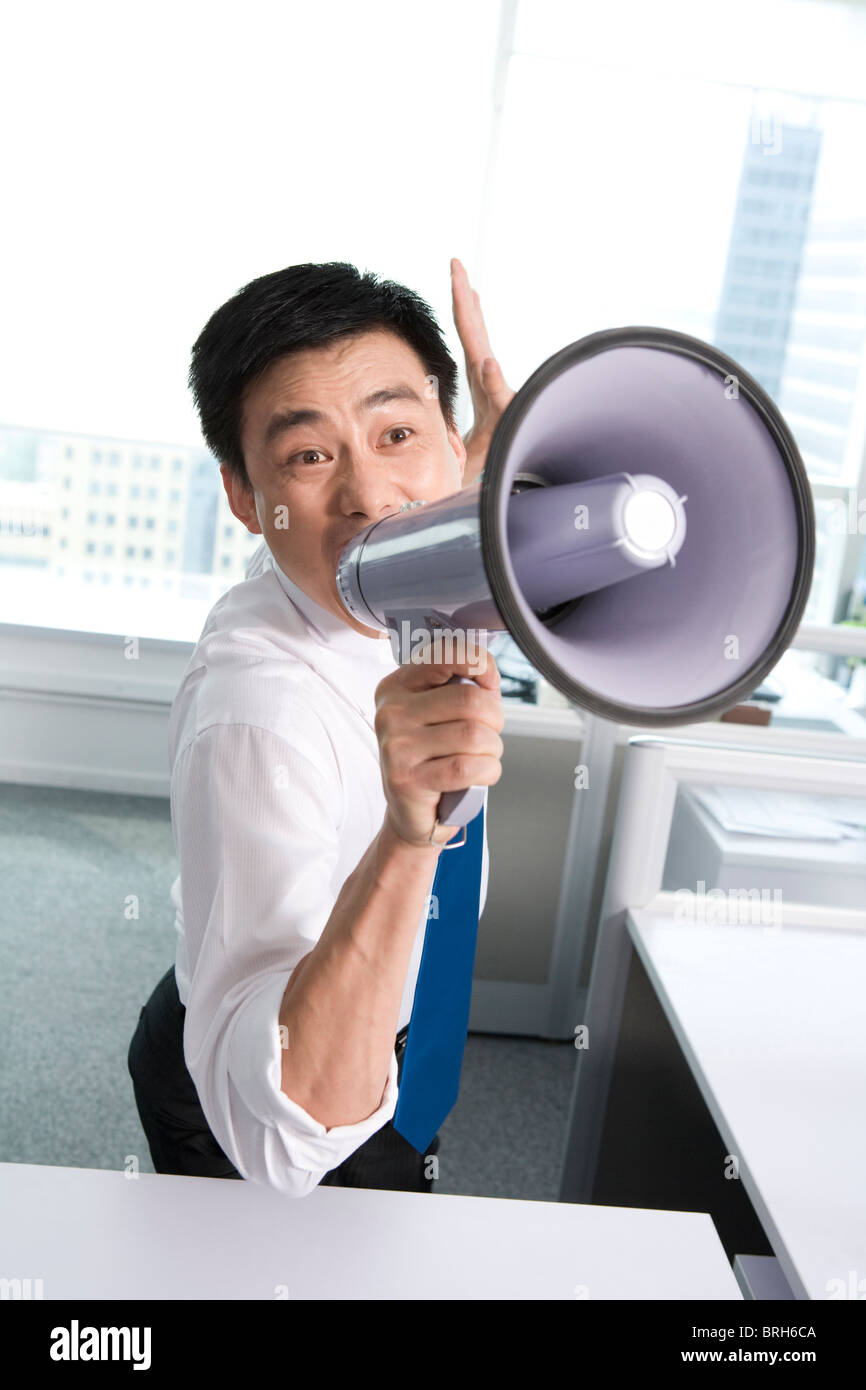 Getting loud in the office Stock Photo Alamy
