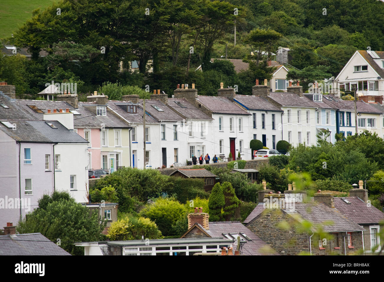 Terraced Cottages On Hillside Overlooking The Welsh Seaside