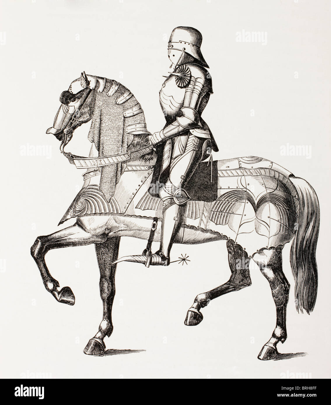 15th century knight in full armour mounted on horse clad in armour. Stock Photo