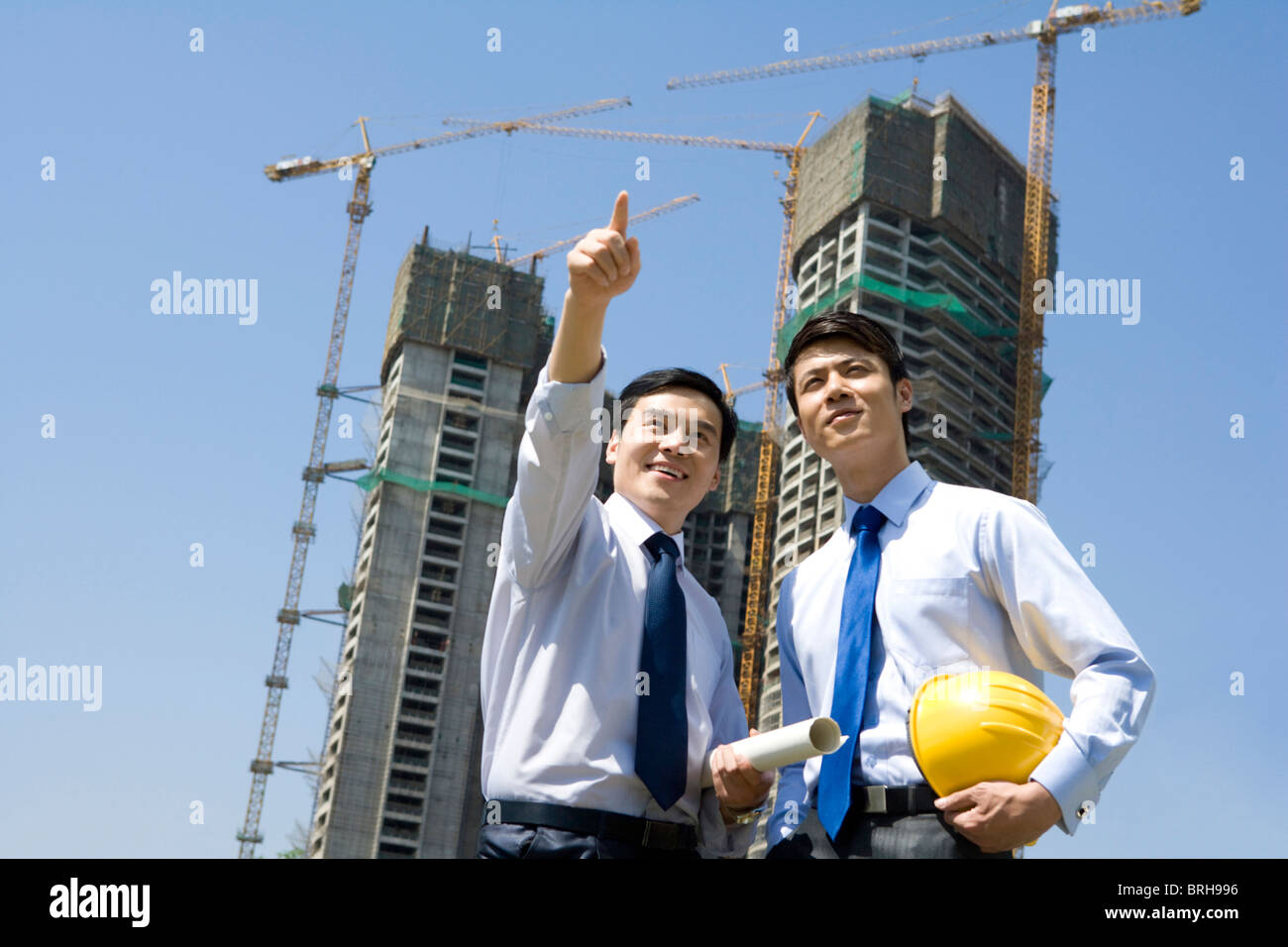 Two young asian architect engineers hi-res stock photography and images ...