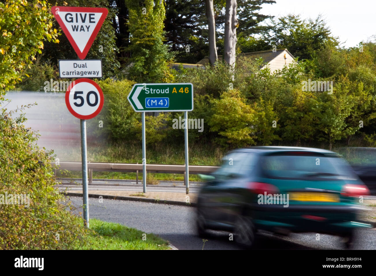 Cars move onto the A46 at Swainswick near Bath Somerset. An accident